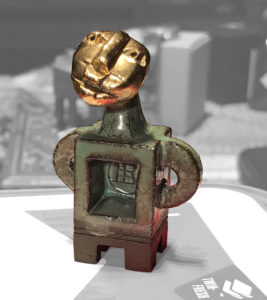 Keramik,vergoldet, Höhe 5cm, seit 2007, Souvenir und Symbol für alle Dessauer, ein Exemplar befindet sich im Grundstein des Bauhausmuseum Dessau